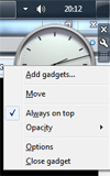 Disable Always on top to restore gadgets to the desktop only